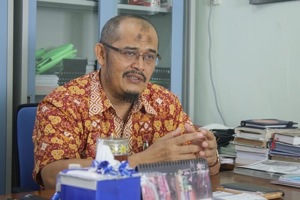 Prof. Dr. H. M. Ali Mansyur, S.H., C.N., M.Hum.